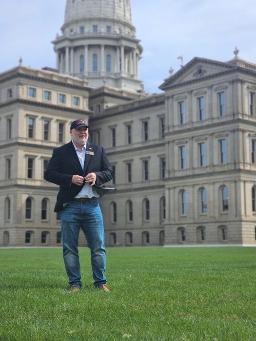 Anthony Hudson outside the Michigan Capitol — photograph from his campaign website