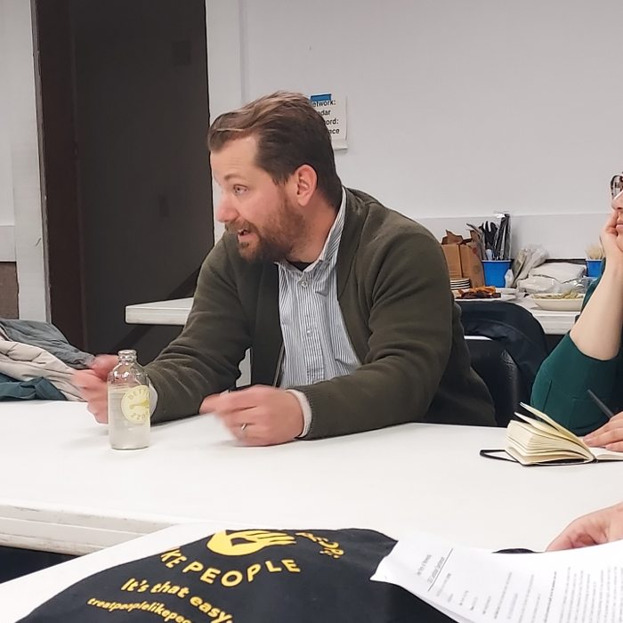 Steven Young speaking at a meeting — photograph from his campaign website