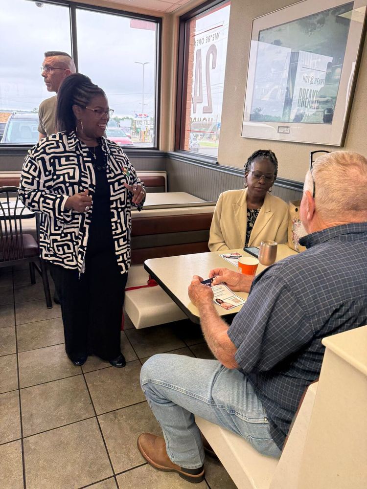 Dione Sims — campaign photograph; group and family photographs are retained as sourced