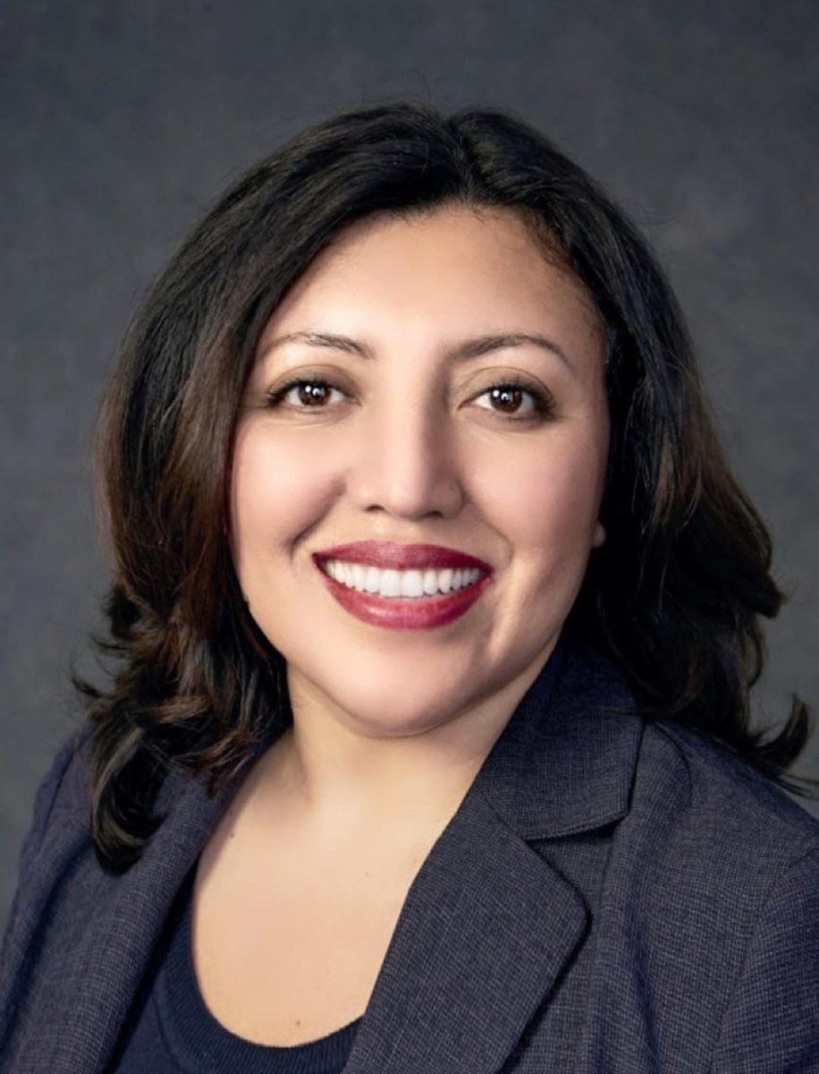 Ericka Ledferd in a dark blazer in her official campaign portrait