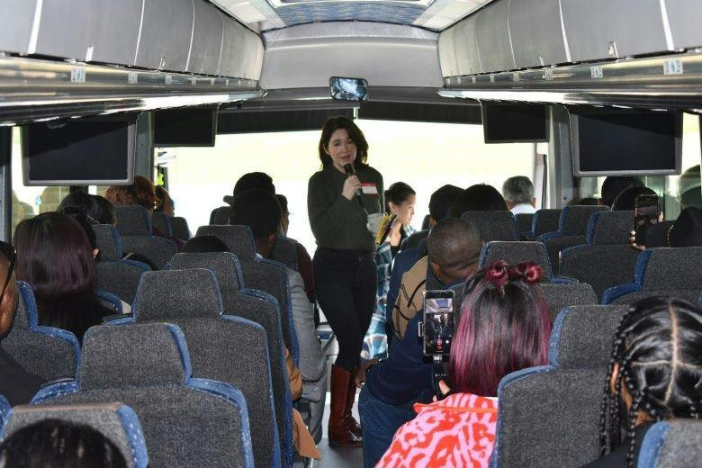 Leticia Gutierrez — photograph from her campaign site speaking to a group on a bus