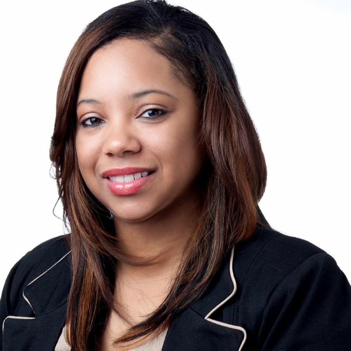 Tiffany Clark in an official portrait wearing a dark blazer